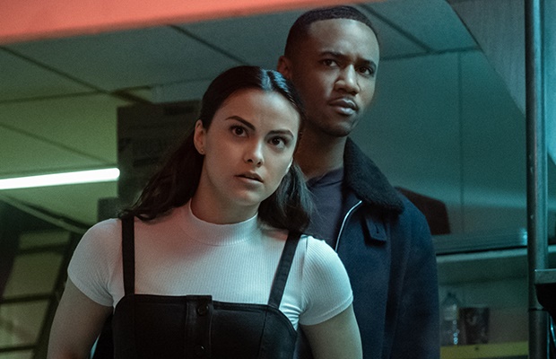 Camila Mendes and Jessie T. Usher in 'Dangerous Lies.' (Eric Milner/Netflix)