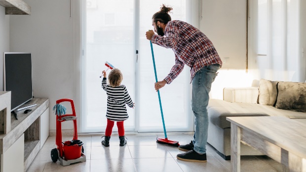 Father and daughter do chores. (PHOTO: Getty Images)