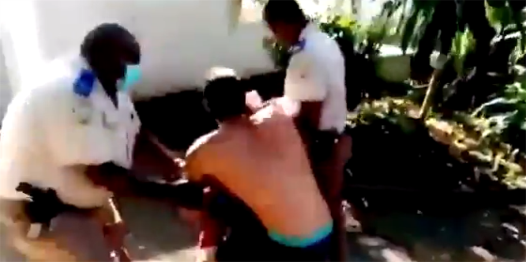 A boy appears to be manhandled by police in KwaZulu-Natal. (Screengrab)