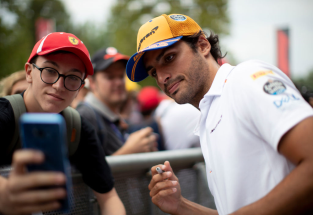 Carlos Sainz Jr. of McLaren F1 Team with fans during the F1 Grand Prix of Italy. (Photo by Marco Canoniero/LightRocket via Getty Images)