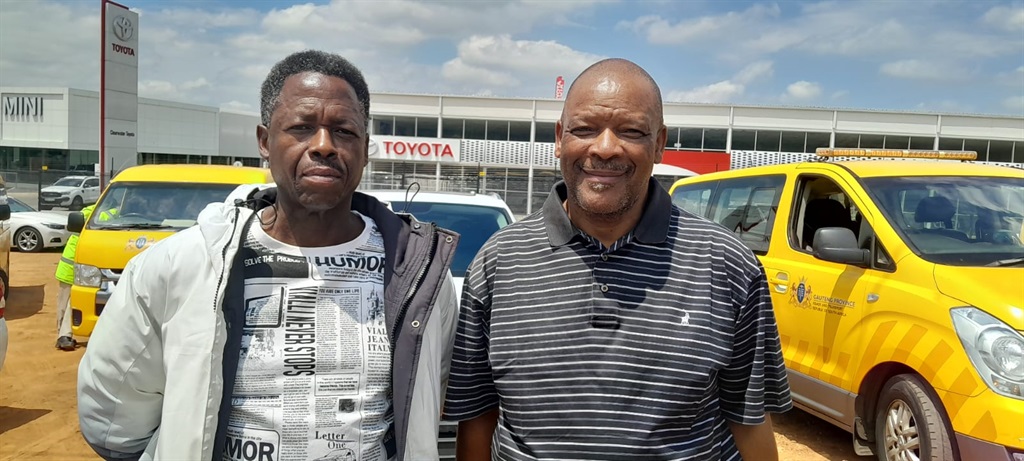 Faraday Taxi Association Sihle Makhanya  and Executive member from South African Bus Owners Association Eric Motswane let out a sigh of relief this as the Hendrick Potgieter Bridge has finally been open after a year long closure.  Photo by Zandile Khumalo