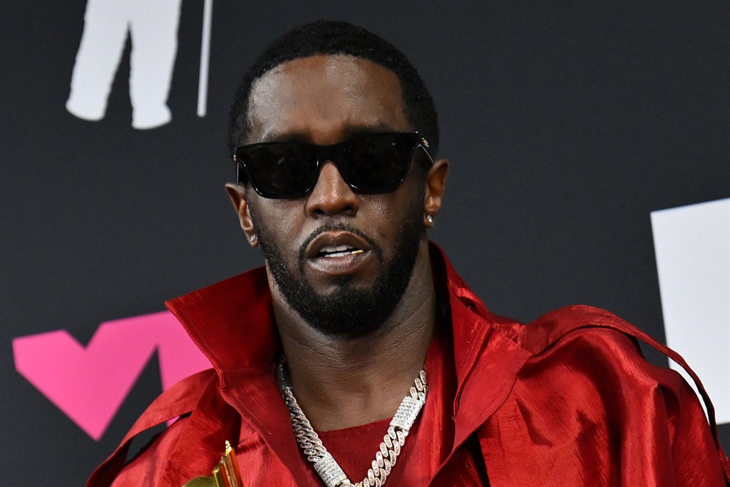 Homes belonging to Sean "Diddy" Combs were being raided by federal agents on 25 March 2024, with the US hip hop mogul at the centre of sex trafficking and sex assault lawsuits. (Angela Weiss/AFP)