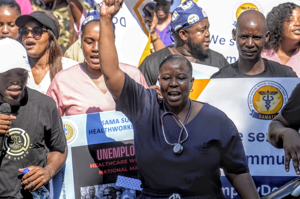 Unemployed healthcare workers marched to the Union Buildings to hand over their memorandum of demands. Photo by Raymond Morare 