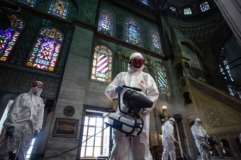 Disinfection works at Sultanahmet Mosque in Istanbul, Turkey, during the coronavirus pandemic. (Sebnem Coskun/Anadolu Agency via Getty Images)
