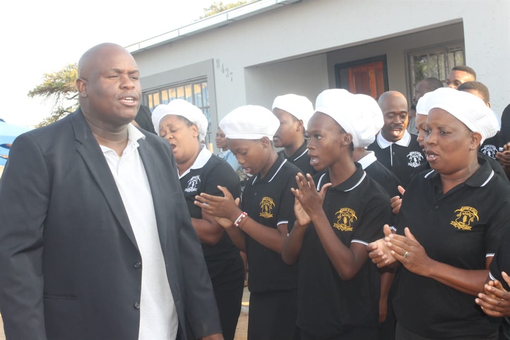 Kopano Ke Matla Gospel Choir comforting mourners through songs. Photo by Thokozile Mnguni