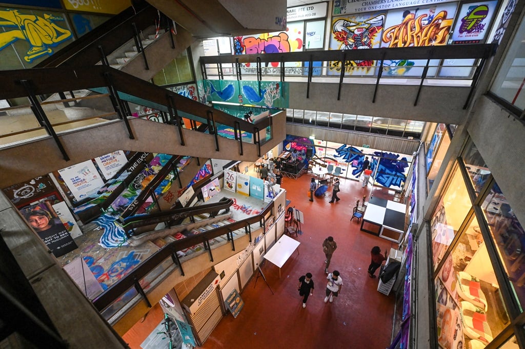 People visit the Peace Centre, an abandoned mall turned into an unexpected art enclave, in Singapore.