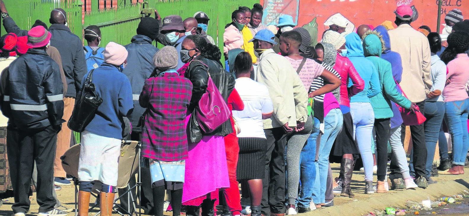 Denosa says staff shortages cause long queues like this, seen outside the Freedom Square Clinic in Bloemfontein. 