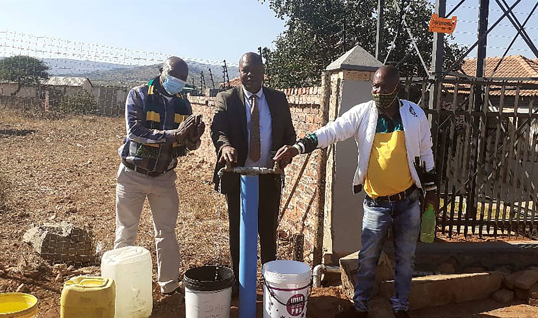 Capricorn District executive mayor John Mpe has connected two Jojo tanks from a borehole in his house as relief to 250 households in Mamatsha village. Picture: supplied