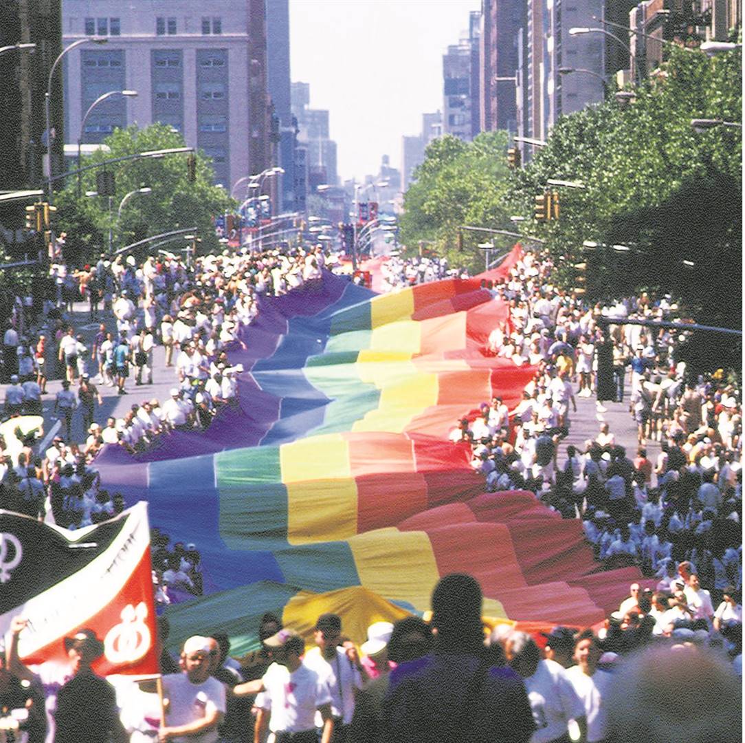 The gay flag is carried though the streets of Manhattan, New York, during a Gay Pride parade. The first parade was held one year after the Stonewall Inn uprising, and was known then as the Christopher Street Liberation Day March, named after the street on which Stonewall Inn is located.PHOTO: Getty images