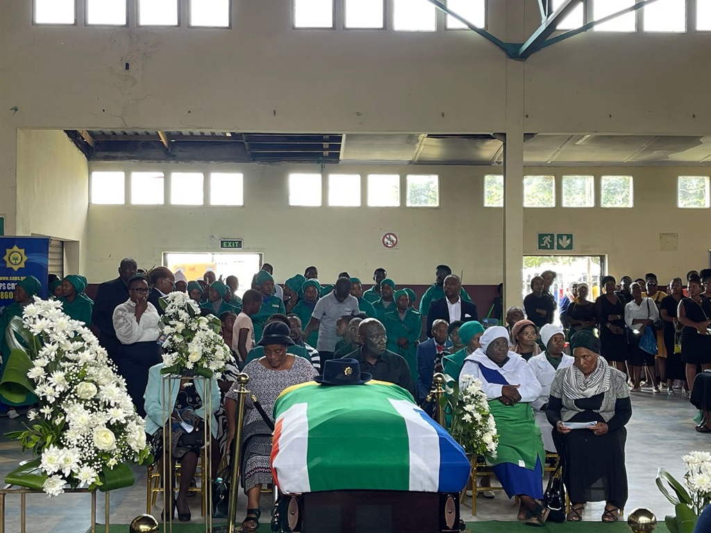 Police Minister Bheki Cele (second from left) was among the mourners at the funeral service of Constable Nosipho Zuma on Saturday. 