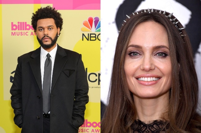 The Weeknd and Angelina Jolie are doing nothing to stop the romance rumours between them. (PHOTO: Gallo Images/Getty Images)