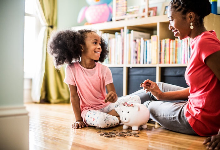 "As parents, we have to change our mindset and culture around saving, debt and money." (MoMo Productions/Getty Images) 