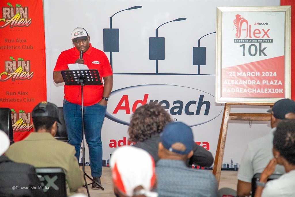 Zuzu Mbatha, of Adreach, addresses the media about the 10km race.