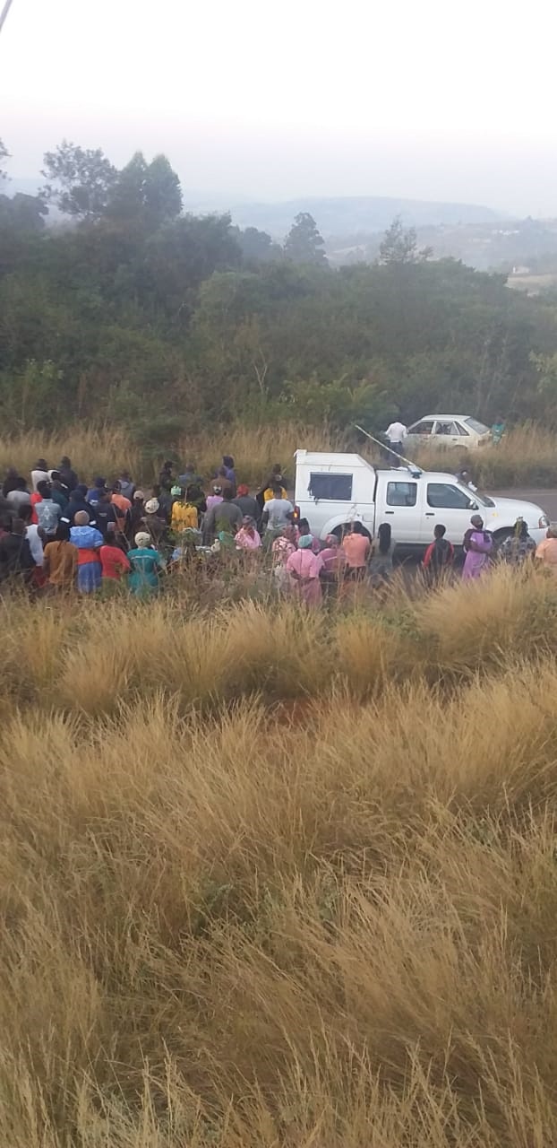 Three men were still trapped in the white car in the bush dead. Photo by Willem Phungula