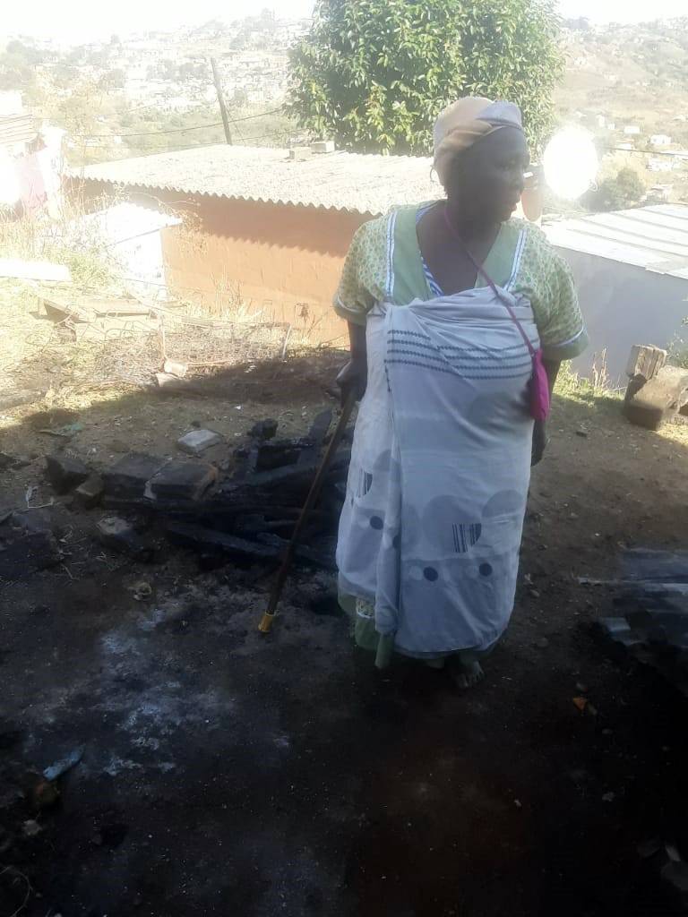 Gogo Neli Luthuli stands at the spot where her shack used to be.Photo by Willem Phungula