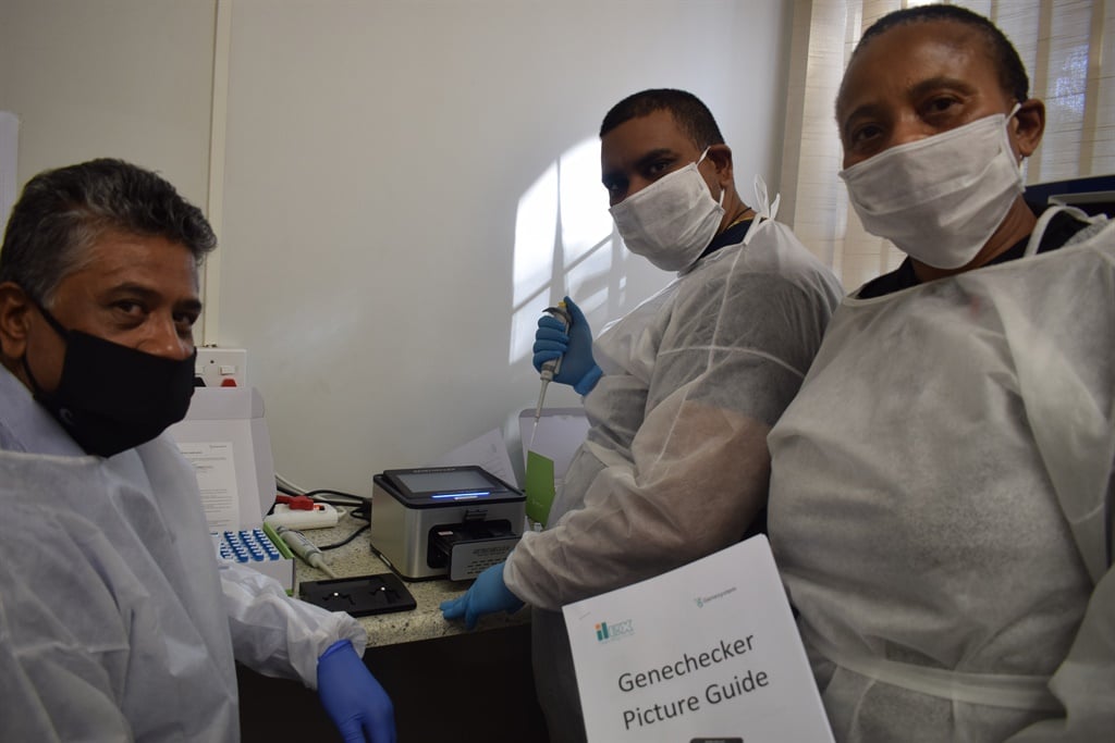 Researchers at the University of KwaZulu-Natal with the ILEX Genehecker. It will help improve the turnaround time for Covid-19 testing. 