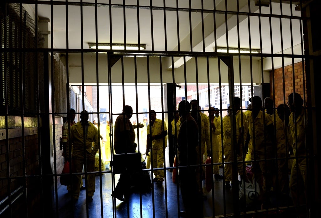 Correctional service officers and prisoners at the Johannesburg Correctional Services centre.