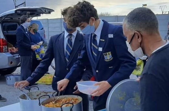 Learners from Rondebosch Boys' High School aiding a soup kitchen. (PHOTO: Facebook/Rondebosch Boys' High School)