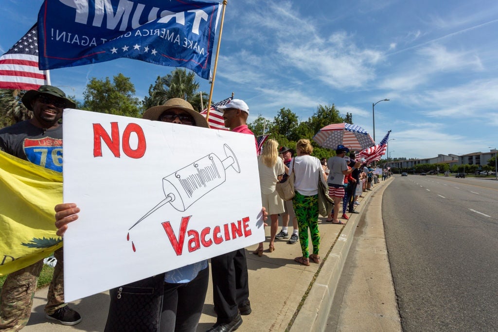 A similar anti-vaccination protest against coronavirus treatment in California.