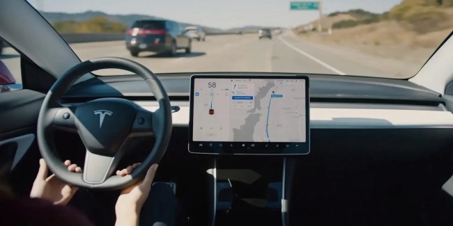 Hands off or ‘guiding?’ Tesla’s Autopilot system has tested regulatory risk and R&D resources. 