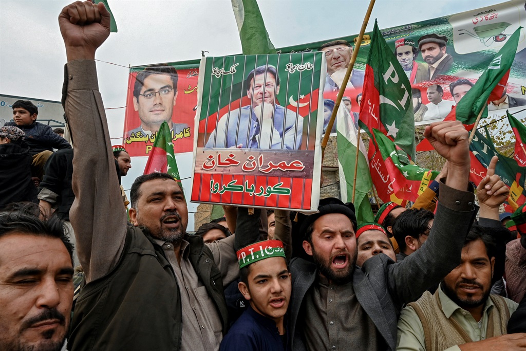 Supporters and activists of Pakistan Tehreek-e-Insaf (PTI) party shout slogans during a protest demanding the release of PTI leader Imran Khan, in Peshawar on 28 January 2024.
