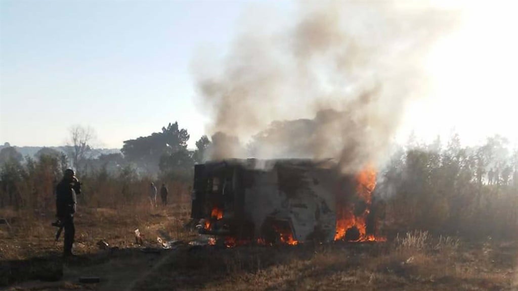 Robbers torched the money in the van with the explosives used to gain access to it. 