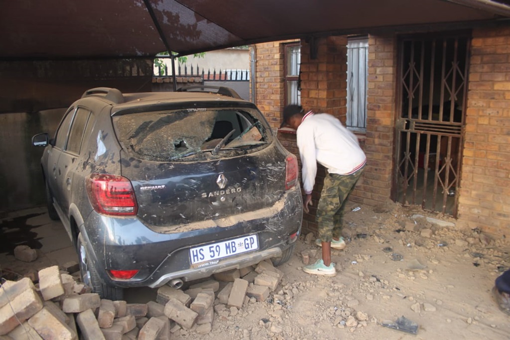 Amateur hijackers crashed into this house in Etwatwa. Photo by Phineas Khoza