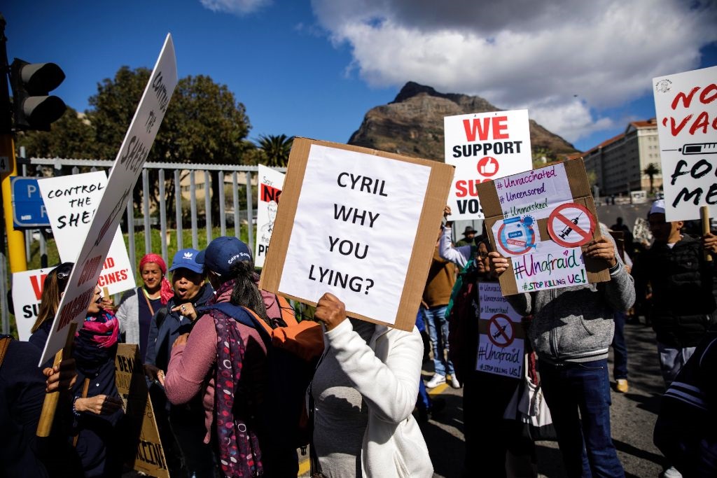 Protesters congregate outside Groote Schuur Hospital in Cape Town on 21 August 2021 to protest against mandatory vaccination.
