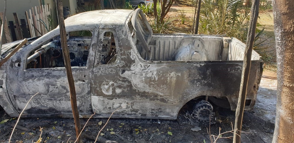The burnt wreck of the vehicle of a witness in an investigation into a beneficiary of National Lotteries Commission. 