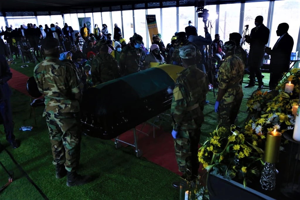  Pallbearers surrounding killed Mapiti Matsena's coffin while the funeral is underway. Photo: Joshua Sebola 