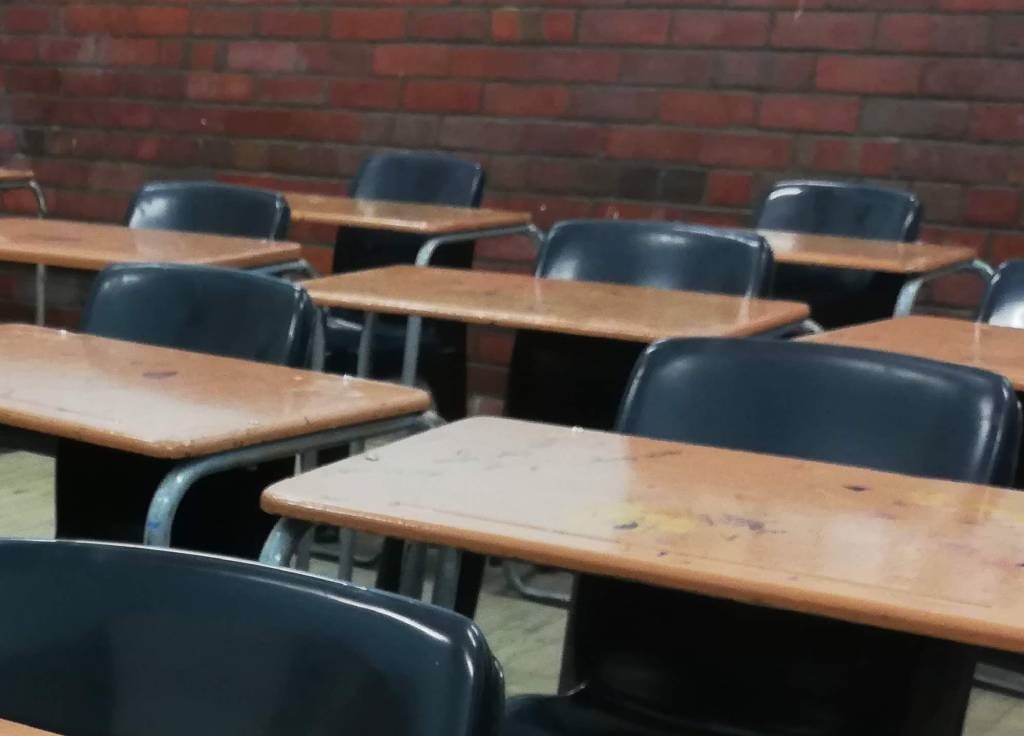 Empty school desks.