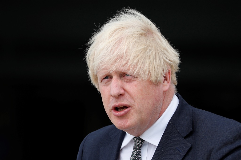 Britain's Prime Minister Boris Johnson leaves following a visit at Northwood Headquarters in London, on 26 August 2021.