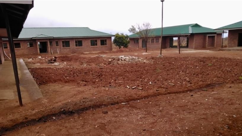 The unfinished classrooms and administration block
