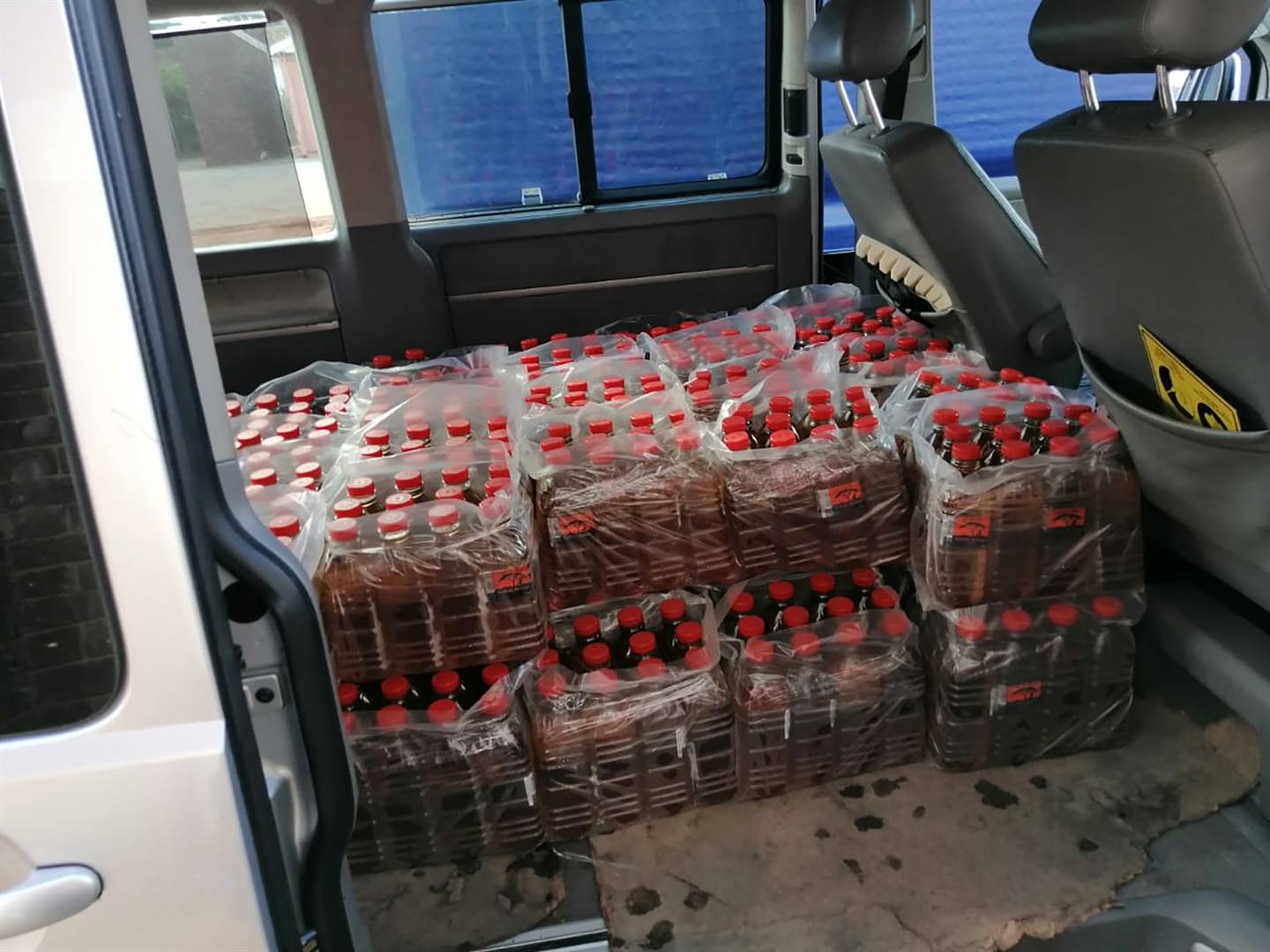 Police confiscated bottles of booze in Kinkelbos near Port Elizabeth. 
