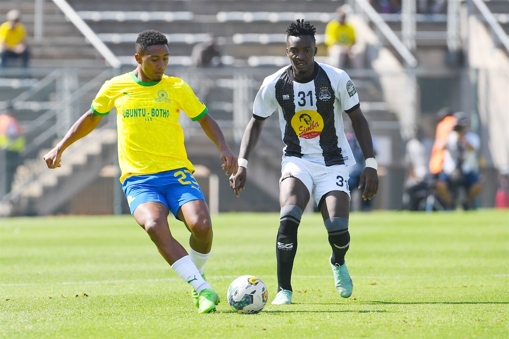 PRETORIA, SOUTH AFRICA - MARCH 03:  Lucas Ribeiro Costa of Mamelodi Sundowns and Ntambwe Kalonji of TP Mazembe during the CAF Champions League match between Mamelodi Sundowns and TP Mazembe at Loftus Versfeld on March 03, 2024 in Pretoria, South Africa. (Photo by Lefty Shivambu/Gallo Images)