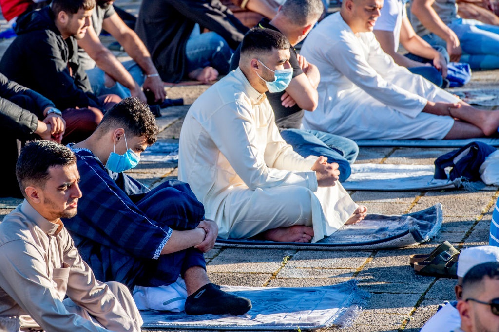 Muslims attend a prayer.