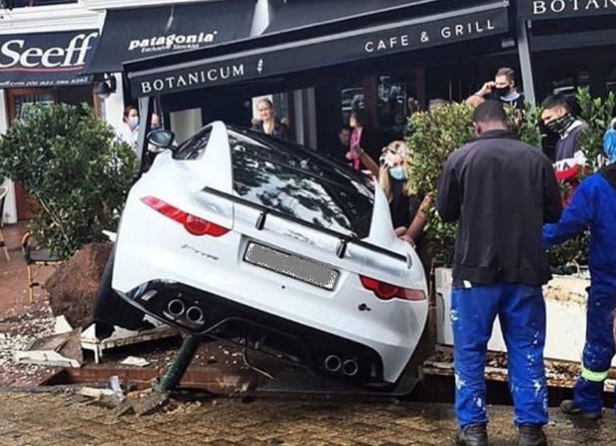 Jaguar sports car crashes into Cape Town cafe ...