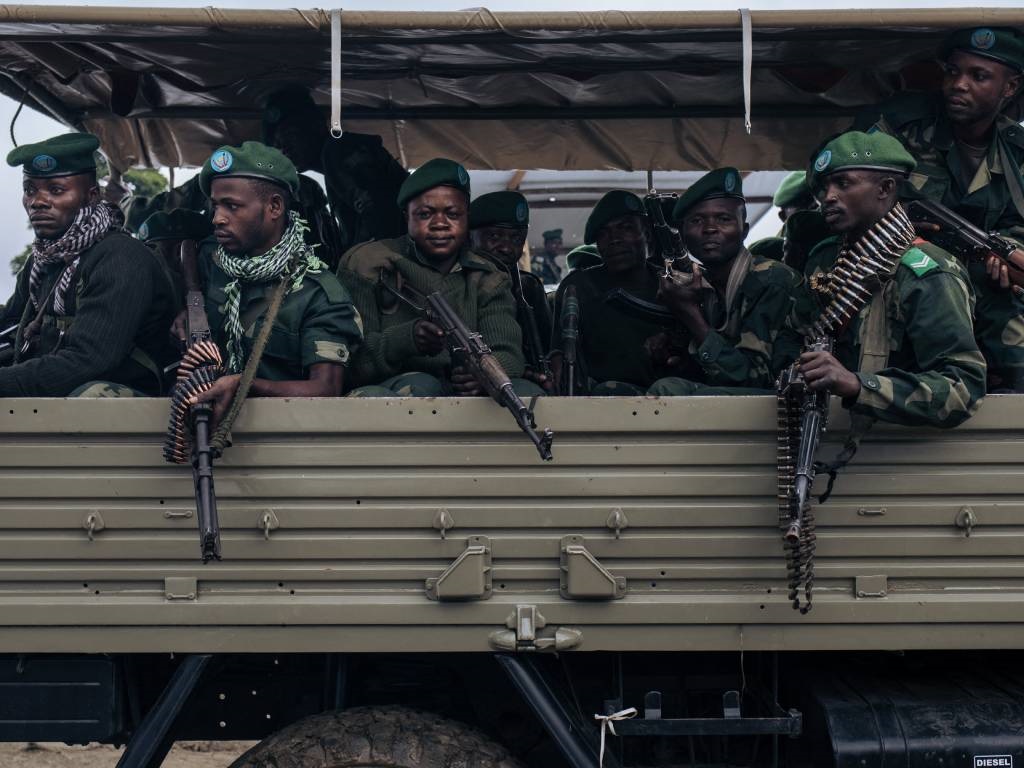 Soldiers conduct a rapid deployment exercise at the joint forward operating base (FOB) between the Congolese army and Virunga National Park on the outskirts of Mutwanga, which has been repeatedly attacked by the armed group Allied Democratic Forces.