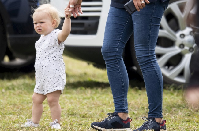 Zara Tindall walking with their daughter Lena