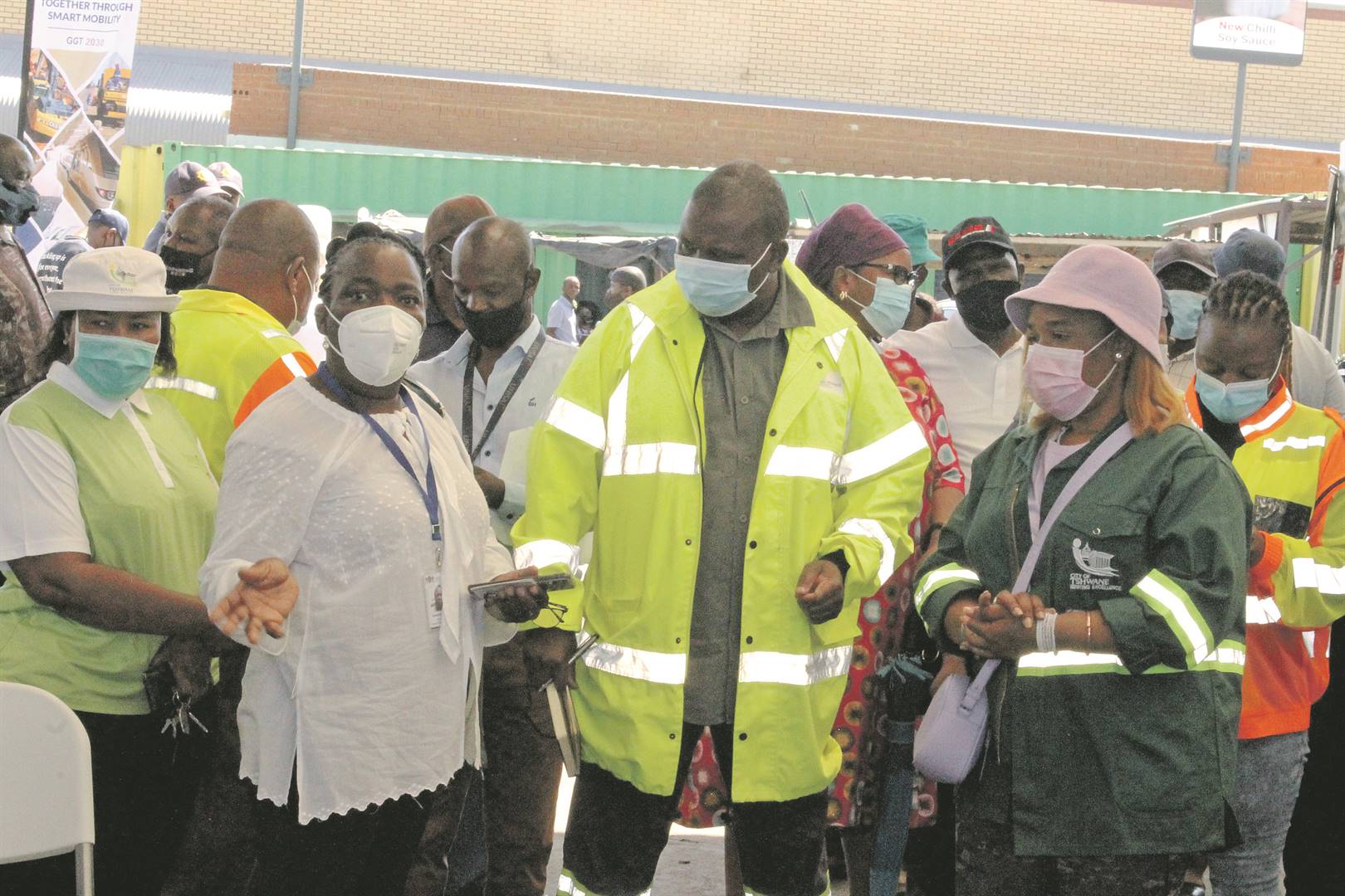 Martha Setlhare (second from left) and MEC Jacob Mamabolo (second from right) have assured the taxi operators and passengers in Hammanskraal that there was nothing wrong in taking the vaccine.             Photo by Thokozile Mnguni