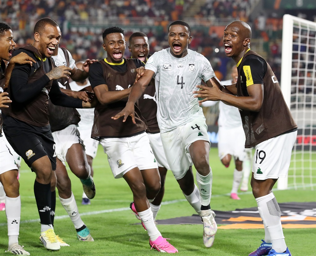 Teboho Mokoena of South Africa celebrates goal with teammates during the 2023 African Cup of Nations match between Morocco and South Africa at the Laurent Pokou Stadium, San Pedro on the 30 January 2024.  Image via SAFAMedia