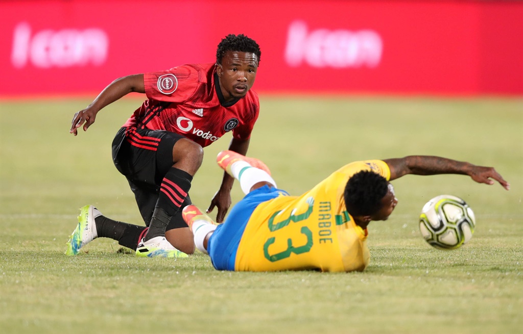 Lebohang Maboe of Sundowns tackled by Paseka Mako of Pirates during the Absa Premiership match at Dobsonville Stadium. Picture: Samuel Shivambu/Gallo Images/Backpagepix