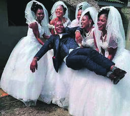 Gobela Sokalezangoma Manzini was held high by his wives.