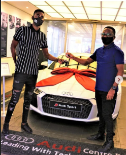 : Vusi Ngubane posing in front of the Audi R8 he pretended to have bought.   Photo from Instagram.