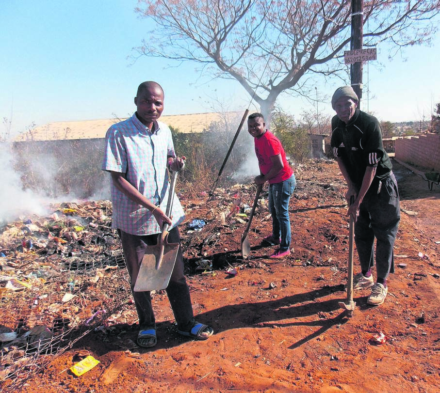 Mafemani Mahori, Doctor Mahori and Sonboy Mashilo have cleaned an illegal dumpsite in their kasi of Lusaka.   Photo by            Aaron Dube