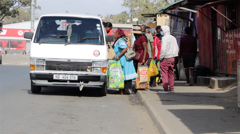 People in Inanda, KwaZulu-Natal climb into a minibus taxi with their masks on. Inanda has been identified as one of the Covid-19 hotspots in the eThekwini district in August 2020.