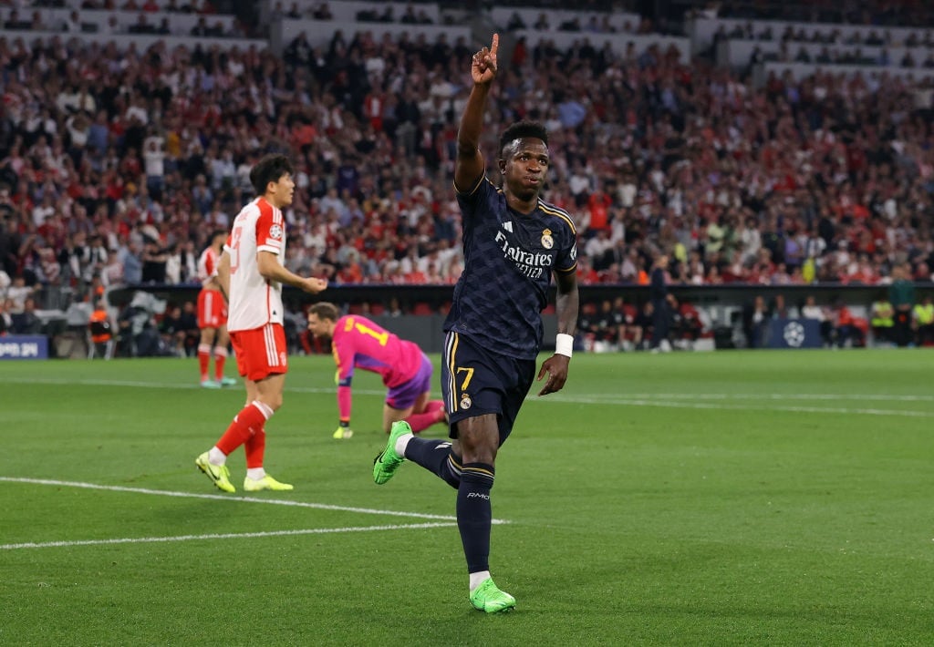 MUNICH, GERMANY - APRIL 30:  Vinicius Junior of Real Madrid celebrates after scoring the opening goal during the UEFA Champions League semi-final first leg match between FC Bayern MÃ¼nchen and Real Madrid at Allianz Arena on April 30, 2024 in Munich, Germany. (Photo by James Gill - Danehouse/Getty Images)
