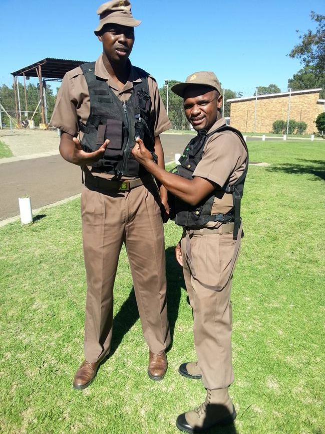 Lungisani Ndlela with another prison warder.