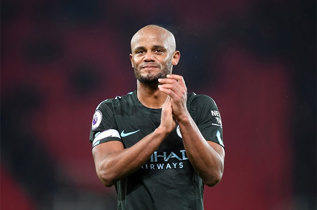 Belgian legend Vincent Kompany clapping home fans while representing Manchester City in the Premier League. (Getty Images)