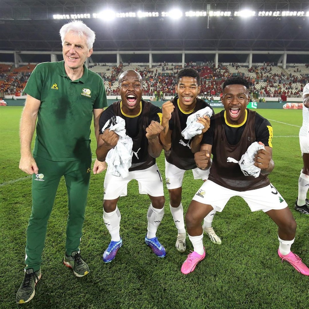 Bafana Bafana players and head coach Hugo Broos celebrate the victory over Morocco.